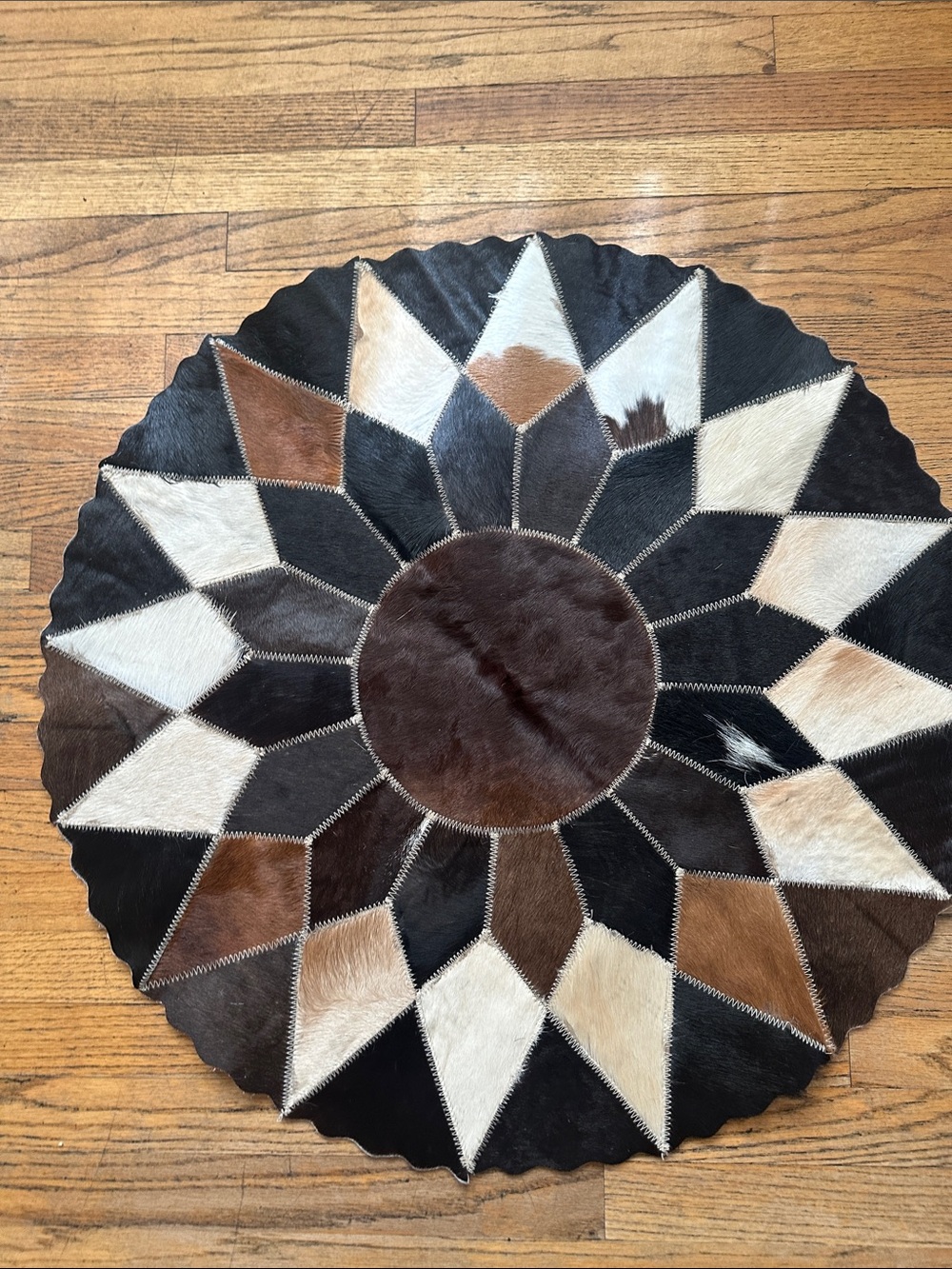 HANDMADE Round Patchwork Cowhide Accent Rug in Brown, Black & Cream